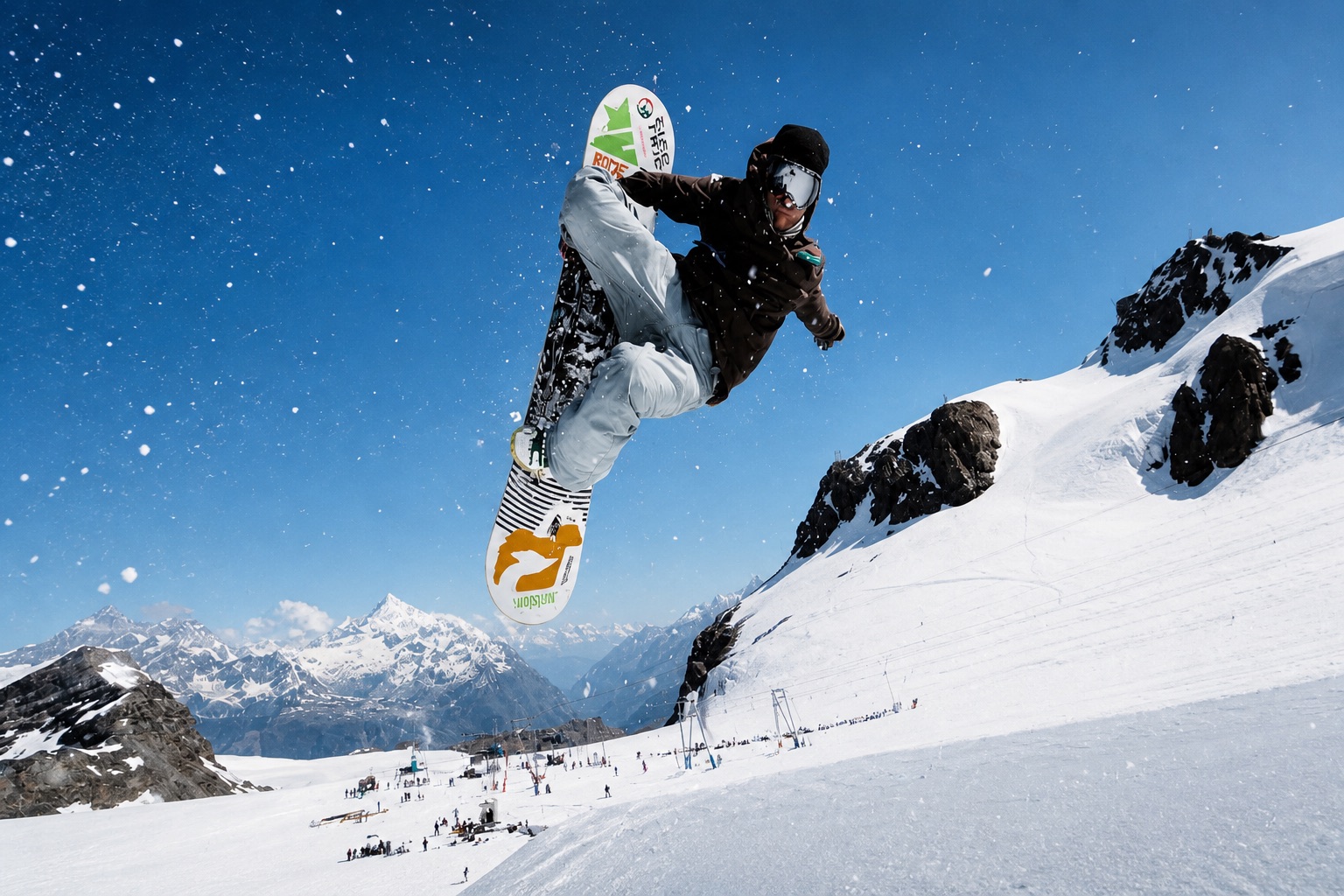 Snowboarder jumping in the Alps